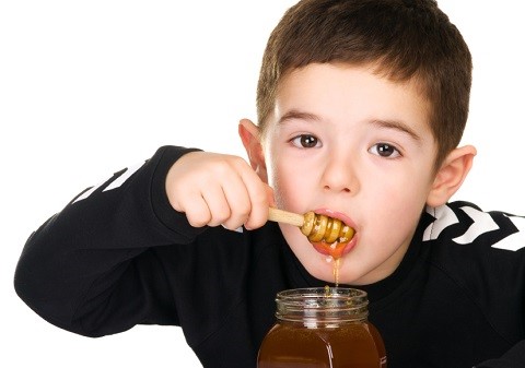 boy-eating-honey.jpg